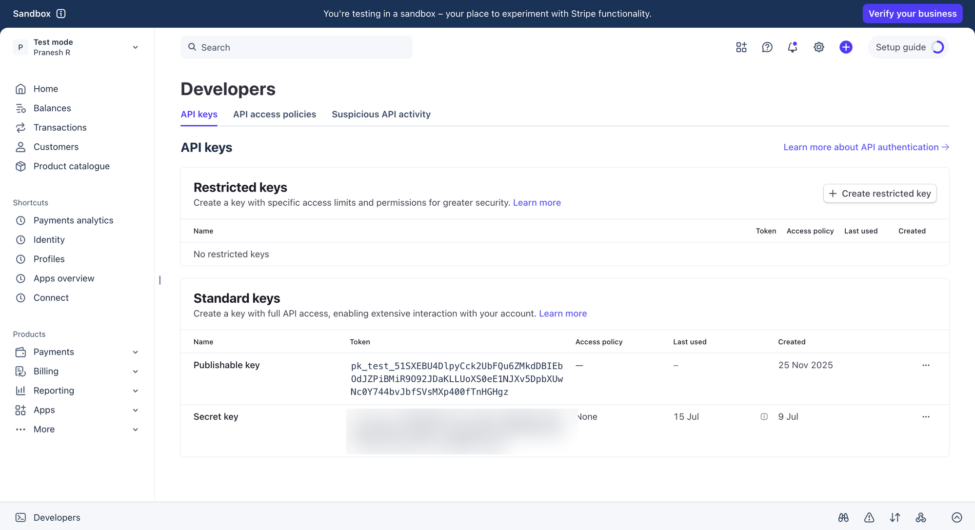 Stripe Developers > API keys page showing the Publishable key and Secret key under Standard keys